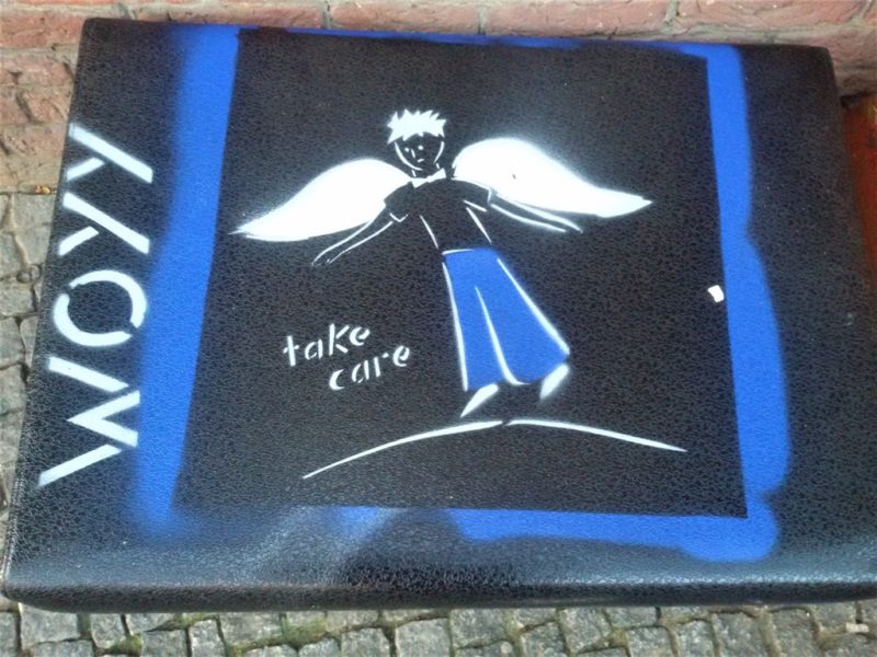 Street art - angel on a cushion