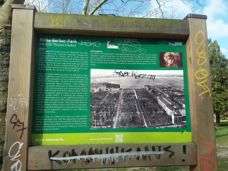 Park Sign with Graffiti