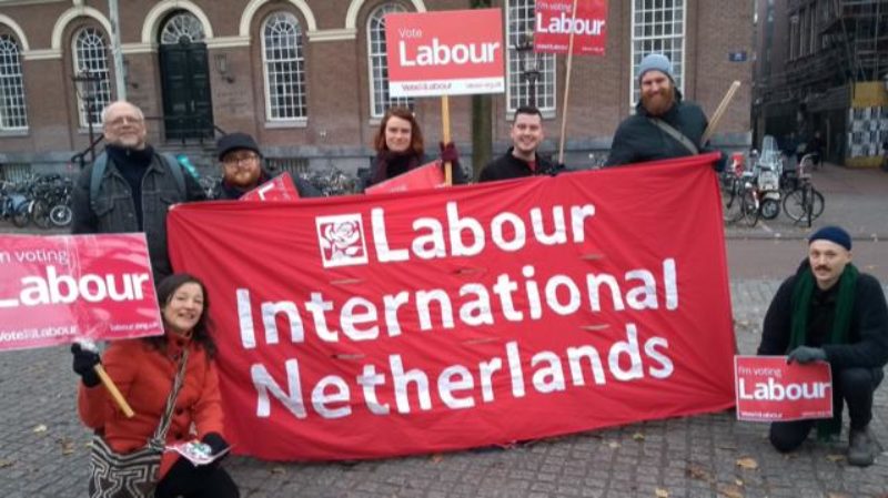 Labour International Netherlands with Banner